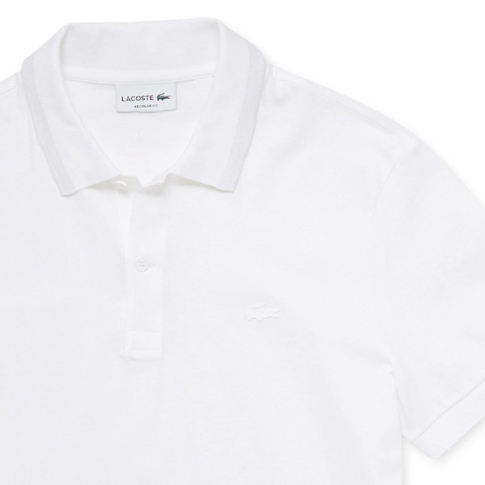 Lacoste polo shirt / size XL. color/White AUTHENTIC. Made in Peru